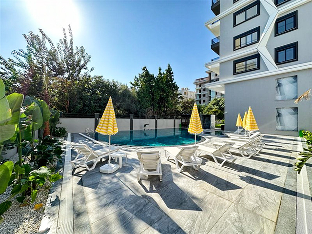 1+1 Wohnung mit hervorragender Infrastruktur im Stadtteil Mahmutlar