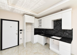 1+1 Wohnung mit hervorragender Infrastruktur im Stadtteil Mahmutlar