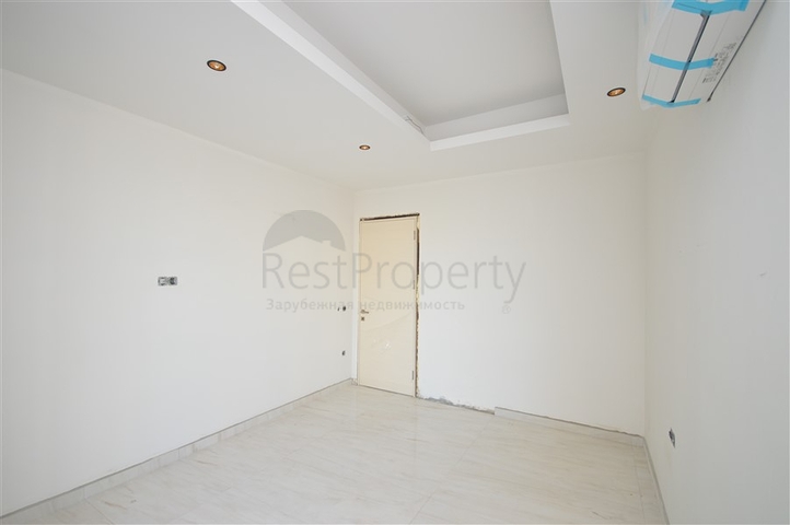 1+1 Wohnung in einem Premium-Komplex an der ersten Küste in Mahmutlar