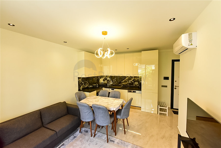 1+1 Wohnung in einem schicken Komplex, nur wenige Gehminuten vom Meer entfernt