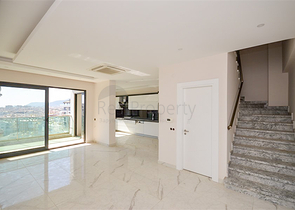 Zweistöckiges 3+1 Penthouse mit geschlossenem Parkplatz und Meerblick in Alanya