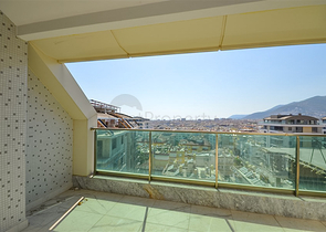 Zweistöckiges 3+1 Penthouse mit geschlossenem Parkplatz und Meerblick in Alanya