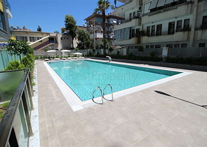 Zweistöckiges 3+1 Penthouse mit geschlossenem Parkplatz und Meerblick in Alanya