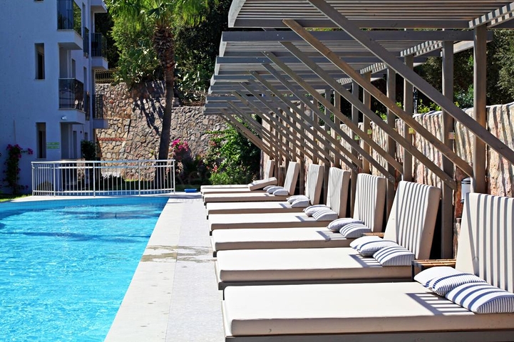 Wir präsentieren ein einzigartiges Boutique-Apartmenthotel, ideal gelegen in einem der beliebtesten Touristengebiete von Bodrum. 
