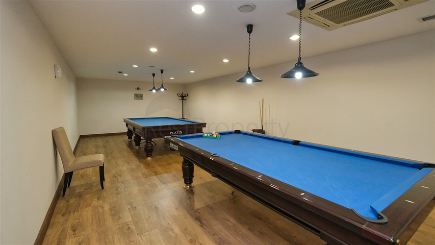 Apartment mit 3+1 Grundriss im Stadtteil Yesilbahce von Antalya 