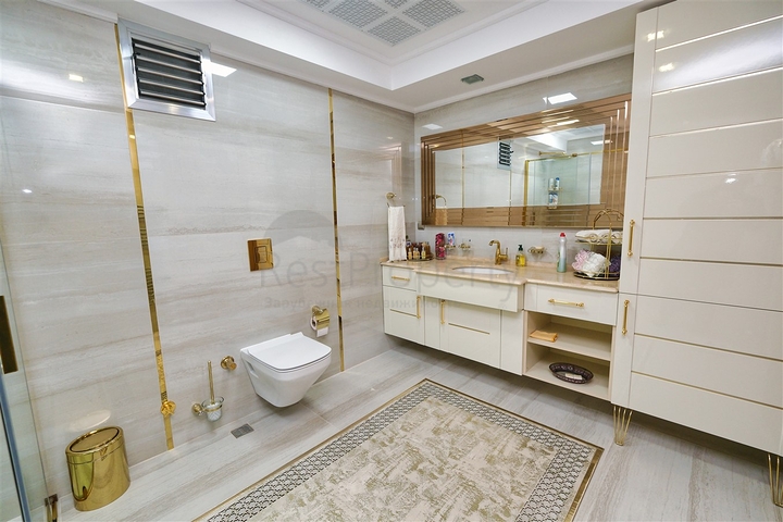 Apartment mit 3+1 Grundriss im Stadtteil Yesilbahce von Antalya 