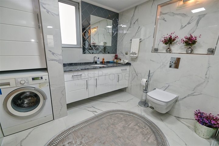 Apartment mit 3+1 Grundriss im Stadtteil Yesilbahce von Antalya 