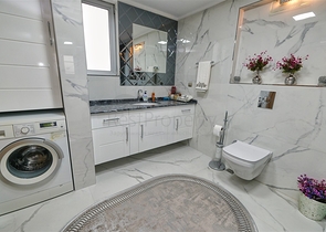 Apartment mit 3+1 Grundriss im Stadtteil Yesilbahce von Antalya 