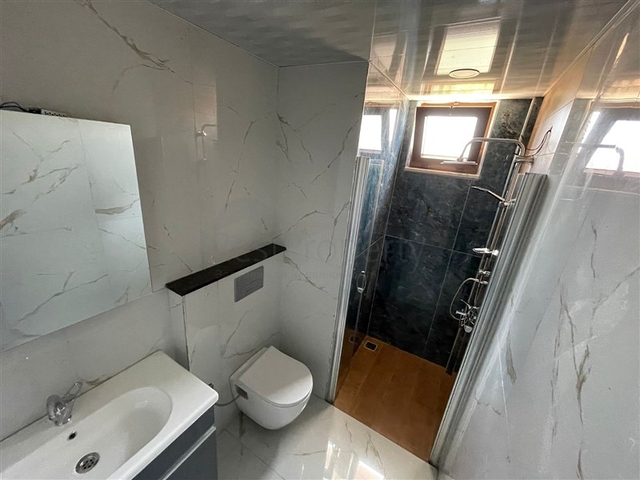 Penthouse mit fünf Schlafzimmern in Avsallar mit Meerblick