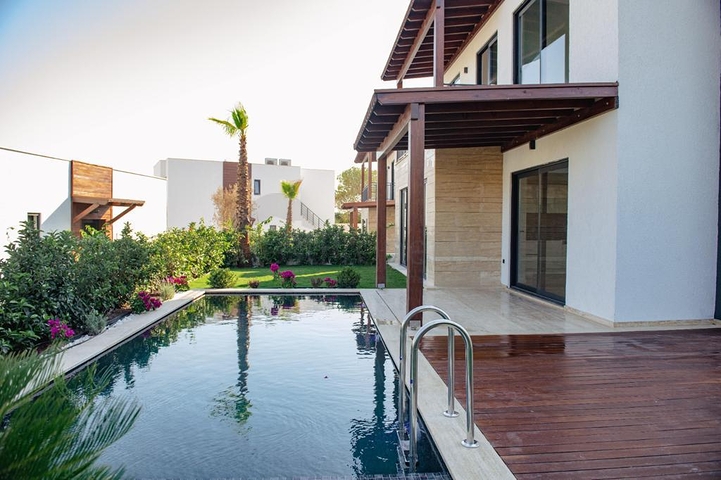 Ein Komplex von Residenzen und Villen in malerischer Lage im Stadtteil Gümüslük