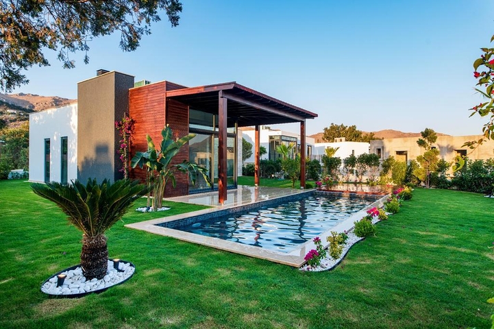 Ein Komplex von Residenzen und Villen in malerischer Lage im Stadtteil Gümüslük