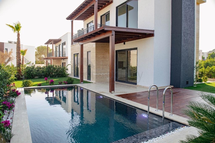 Ein Komplex von Residenzen und Villen in malerischer Lage im Stadtteil Gümüslük