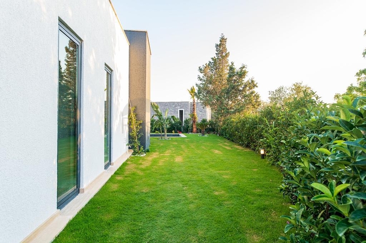 Ein Komplex von Residenzen und Villen in malerischer Lage im Stadtteil Gümüslük