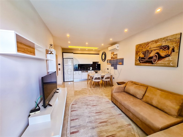 1+1 Wohnung in der ersten Zeile im Stadtteil Mahmutlar 