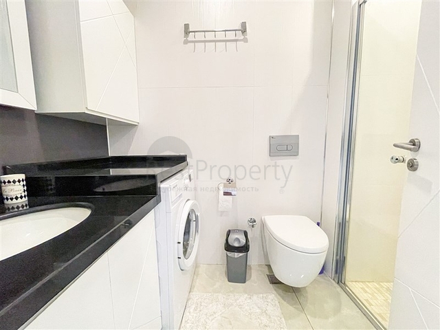 1+1 Wohnung in der ersten Zeile im Stadtteil Mahmutlar 