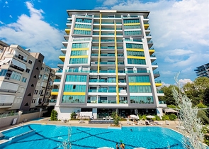 1+1 Wohnung in der ersten Zeile im Stadtteil Mahmutlar 