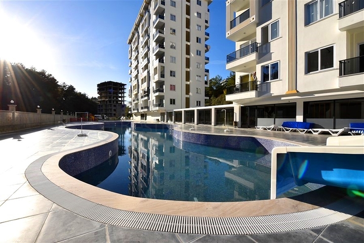 Neue 1+1 Wohnung umgeben von Pinienwäldern in einem Komplex mit reicher Infrastruktur Neue 1+1 Wohnung umgeben von Pinienwäldern in einem Komplex mit reicher Infrastruktur