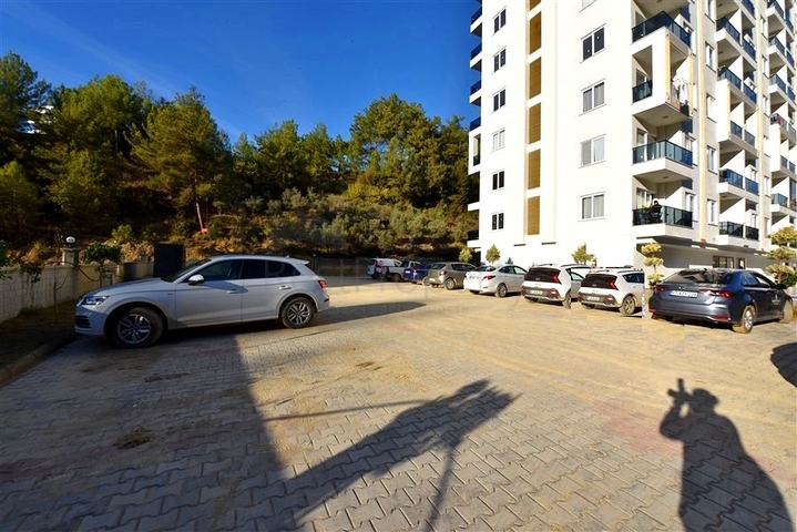 Neue 1+1 Wohnung umgeben von Pinienwäldern in einem Komplex mit reicher Infrastruktur Neue 1+1 Wohnung umgeben von Pinienwäldern in einem Komplex mit reicher Infrastruktur