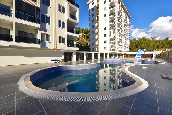 Neue 1+1 Wohnung umgeben von Pinienwäldern in einem Komplex mit reicher Infrastruktur Neue 1+1 Wohnung umgeben von Pinienwäldern in einem Komplex mit reicher Infrastruktur