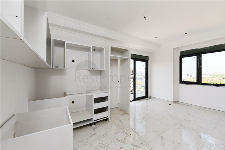 1+1 Wohnung in einem neuen Haus im Stadtteil Mahmutlar