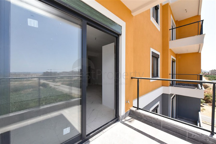 1+1 Wohnung in einem neuen Haus im Stadtteil Mahmutlar