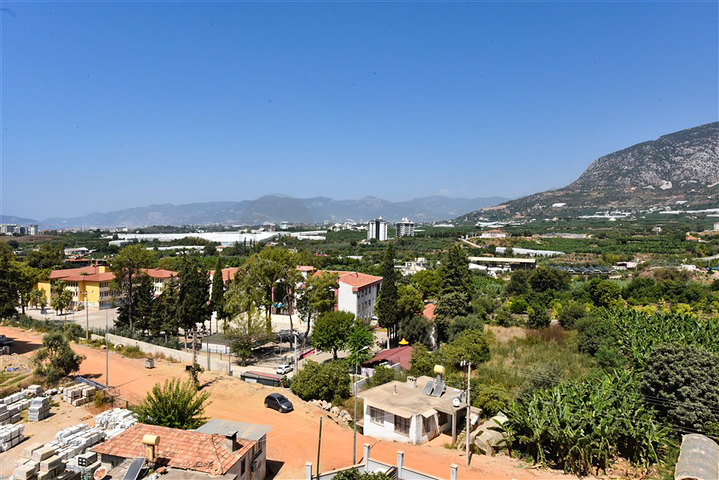 1+1 Wohnung in einem neuen Haus im Stadtteil Mahmutlar