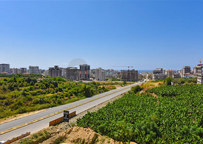 1+1 Wohnung in einem neuen Haus im Stadtteil Mahmutlar
