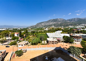 1+1 Wohnung in einem neuen Haus im Stadtteil Mahmutlar