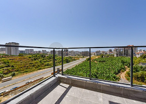 1+1 Wohnung in einem neuen Haus im Stadtteil Mahmutlar