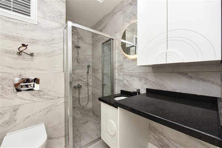 1+1 Wohnung in einer neuen Wohnanlage im Stadtteil Mahmutlar