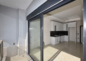 1+1 Wohnung in einer neuen Wohnanlage im Stadtteil Mahmutlar