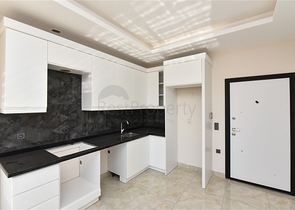 1+1 Wohnung in einer neuen Wohnanlage im Stadtteil Mahmutlar