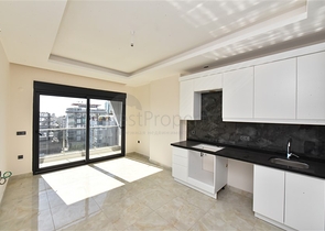 1+1 Wohnung in einer neuen Wohnanlage im Stadtteil Mahmutlar