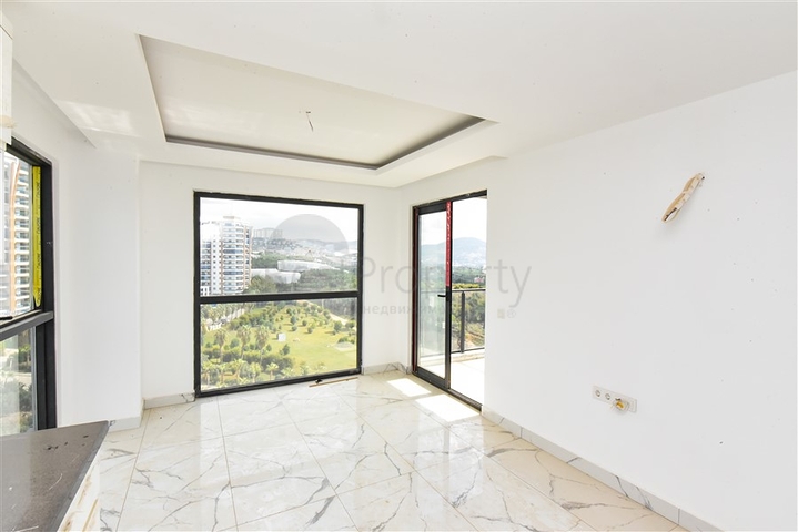 1+1 Wohnung mit Berg- und Meerblick im Stadtteil Mahmutlar