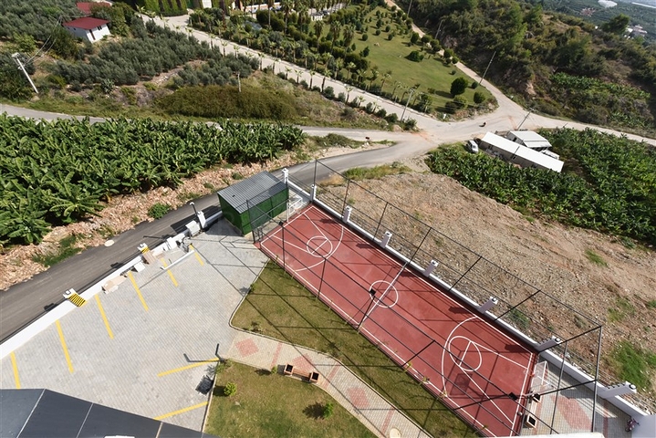 1+1 Wohnung mit Berg- und Meerblick im Stadtteil Mahmutlar