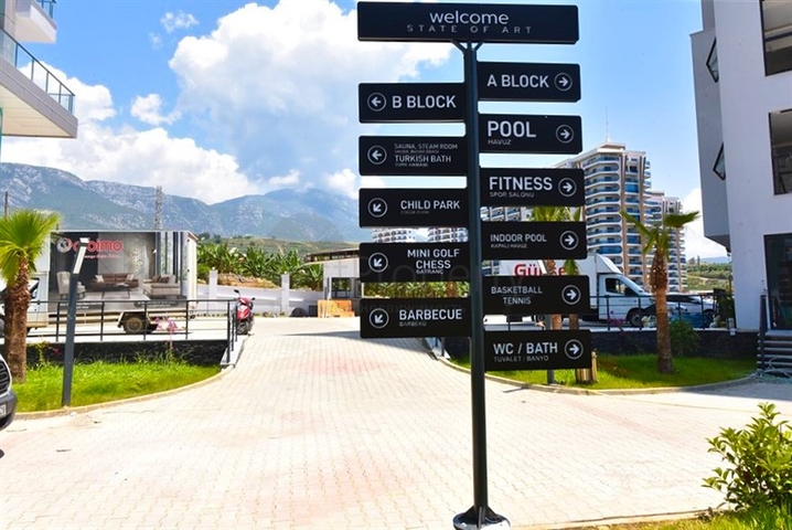 1+1 Wohnung mit Berg- und Meerblick im Stadtteil Mahmutlar
