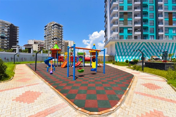 1+1 Wohnung mit Berg- und Meerblick im Stadtteil Mahmutlar