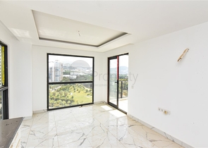 1+1 Wohnung mit Berg- und Meerblick im Stadtteil Mahmutlar