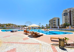 1+1 Wohnung mit Berg- und Meerblick im Stadtteil Mahmutlar