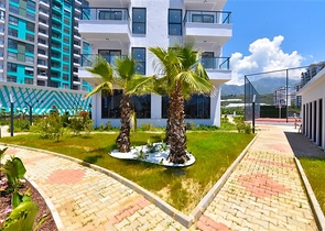 1+1 Wohnung mit Berg- und Meerblick im Stadtteil Mahmutlar