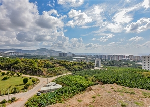 1+1 Wohnung mit Berg- und Meerblick im Stadtteil Mahmutlar