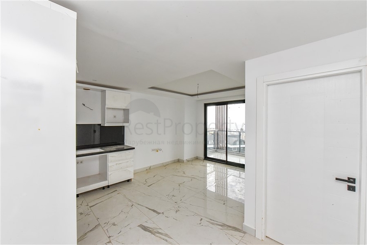 1+1 Wohnung in einem neuen Haus im Stadtteil Mahmutlar