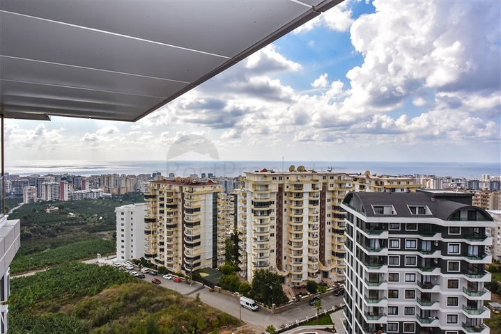 1+1 Wohnung in einem neuen Haus im Stadtteil Mahmutlar