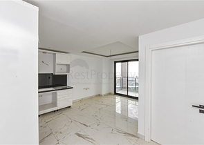 1+1 Wohnung in einem neuen Haus im Stadtteil Mahmutlar