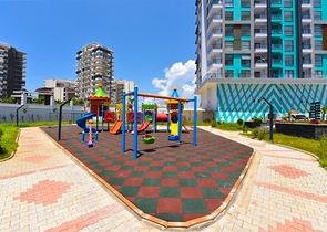 1+1 Wohnung in einem neuen Haus im Stadtteil Mahmutlar