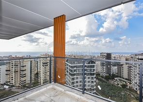 1+1 Wohnung in einem neuen Haus im Stadtteil Mahmutlar