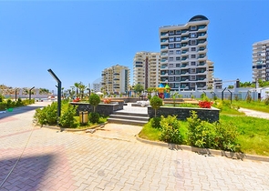 1+1 Wohnung in einem neuen Haus im Stadtteil Mahmutlar