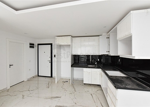 1+1 Wohnung in einem neuen Haus im Stadtteil Mahmutlar