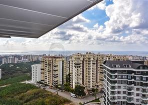 1+1 Wohnung in einem neuen Haus im Stadtteil Mahmutlar