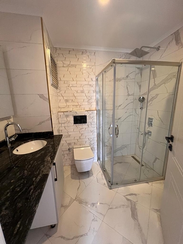 3+1 Wohnung in einem neuen Komplex mit einem großen Grundstück